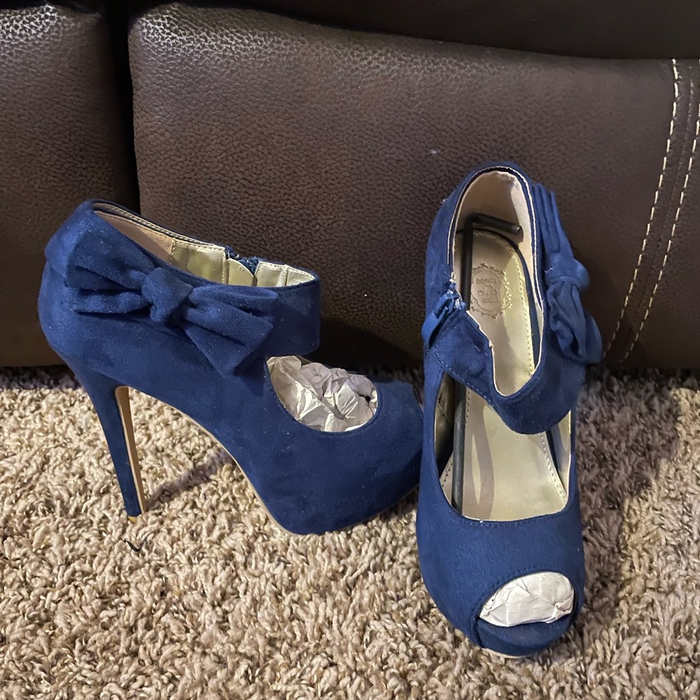 Blue Suede Shoes with a bow on the sides